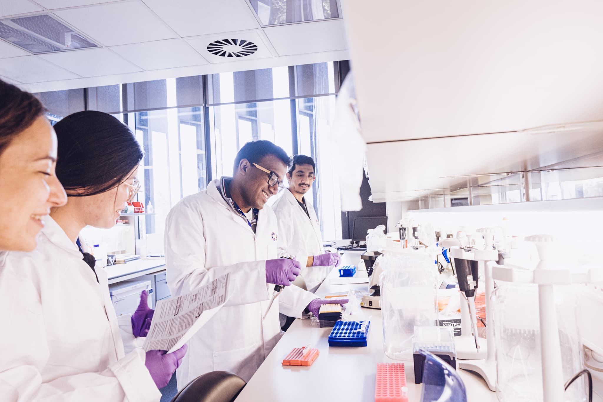 A group of researchers working in the lab.