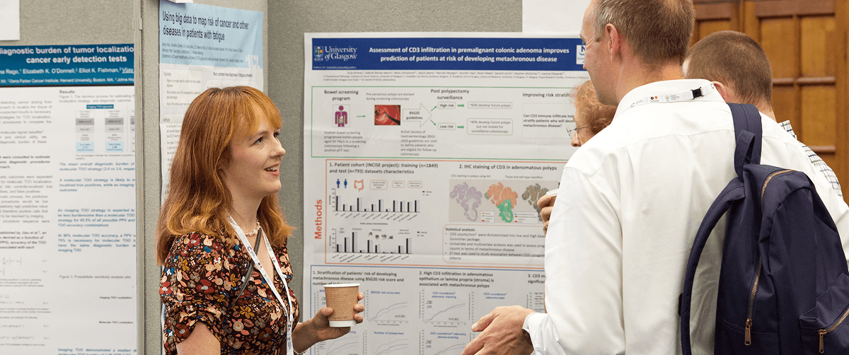 Images of researchers standing together during a conference and talking about a poster that's being presented.