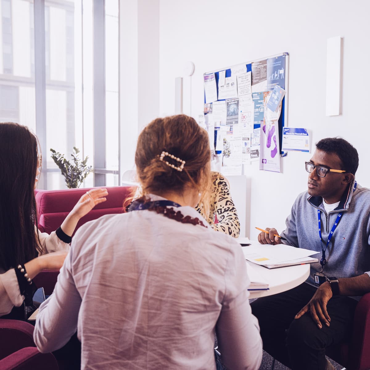 Group of researchers engaged in a discussion.