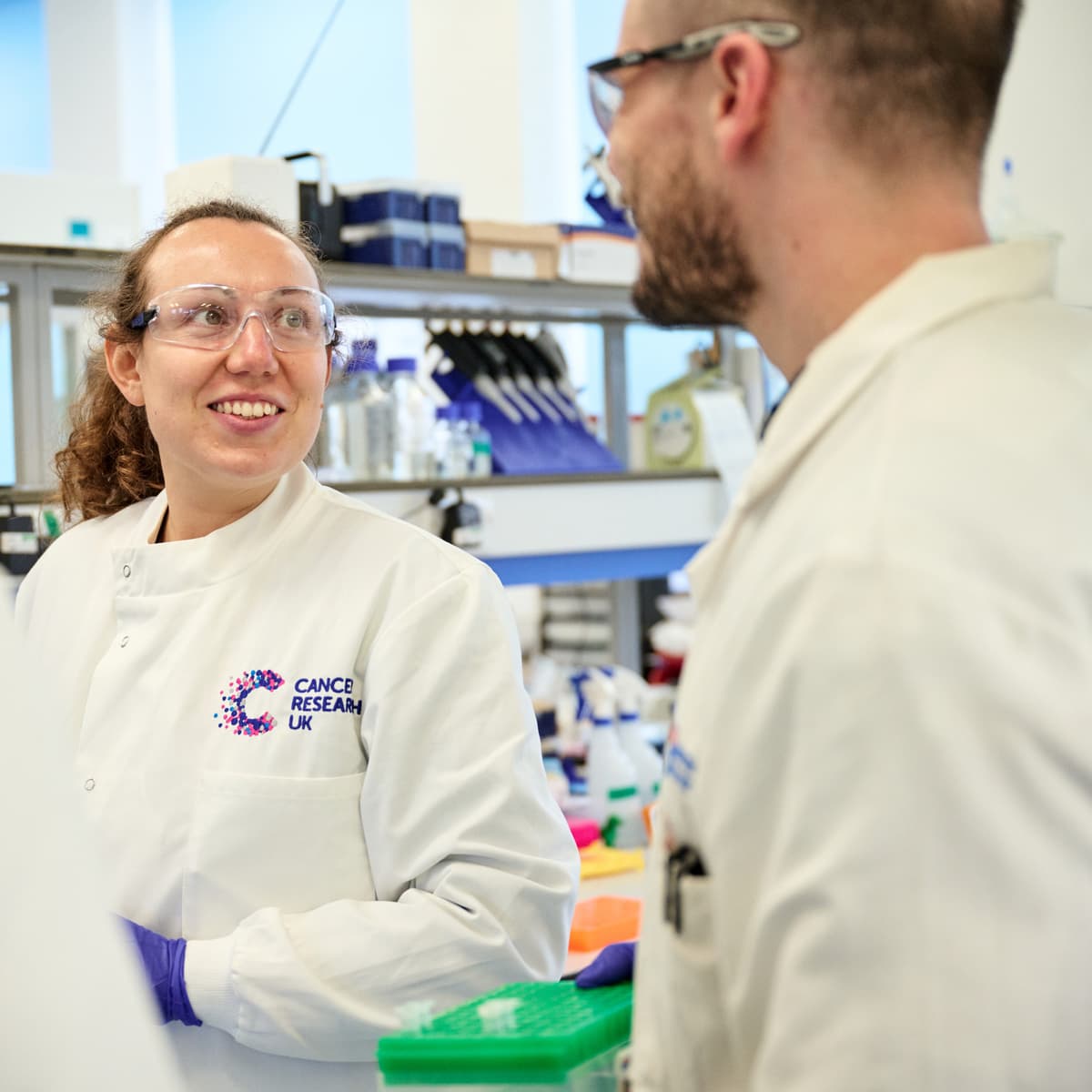 Three researchers in a lab.